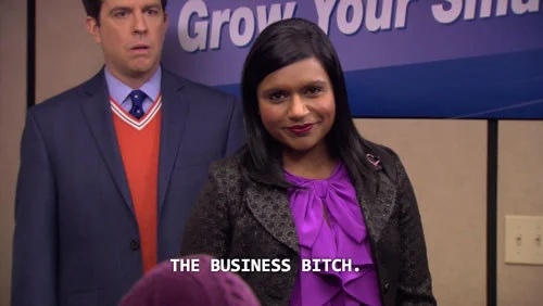 Still from The Office captioned 'The business bitch,' referring to Kelly Kapoor.